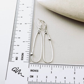 Offset Dot Elongated Loop Earrings