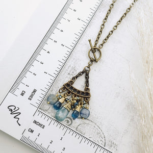 TN Blue Kyanite & London Blue Topaz Pendant (Brass)