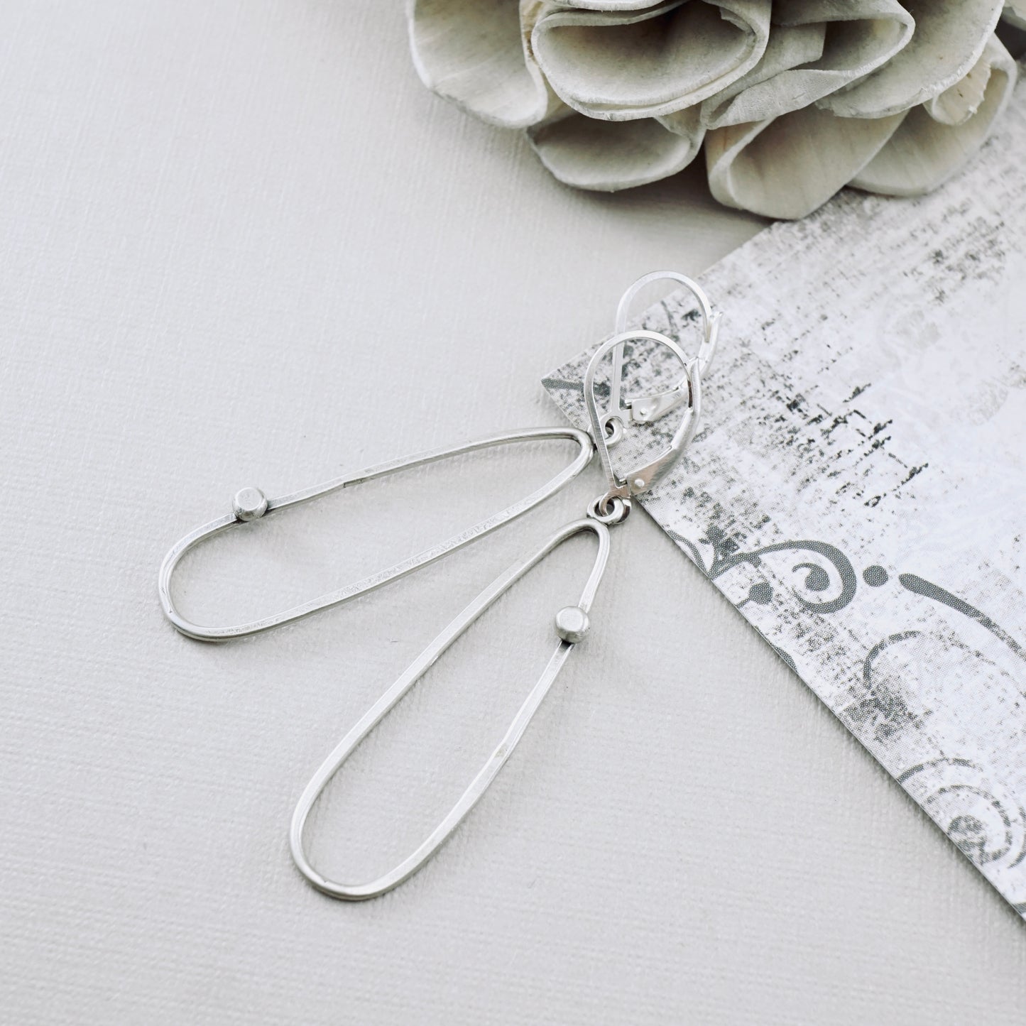 Offset Dot Elongated Loop Earrings