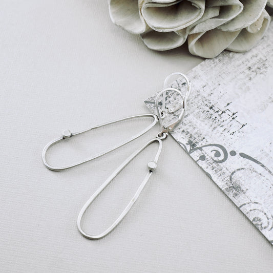 Offset Dot Elongated Loop Earrings
