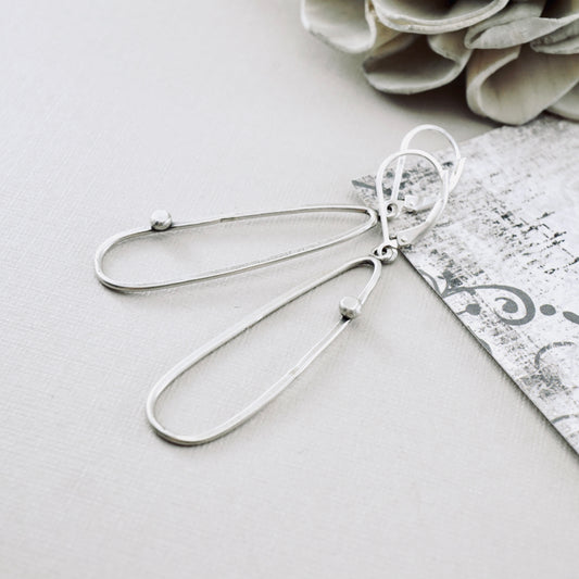 Offset Dot Elongated Loop Earrings