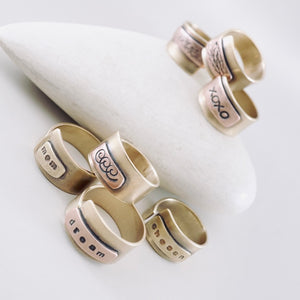 TN Rings with a Voice - Sand Texture - Brass (Size 8)