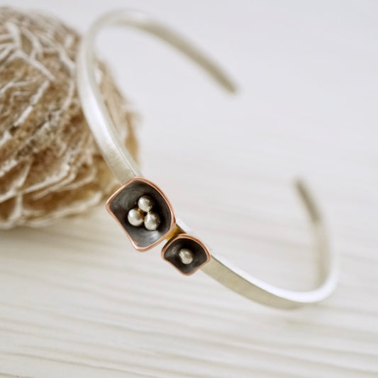 Unique, artisan designed, handmade sterling silver and copper cuff bracelet | Square Pods collection